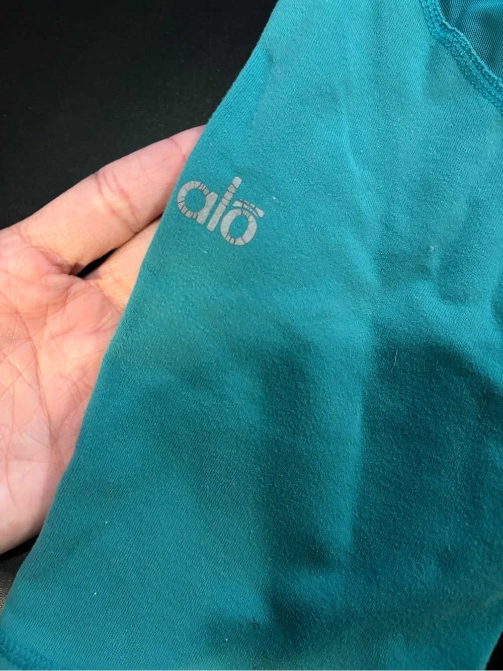 Alo blue leggings. Rip tag removed. Please see pictures for measurements.